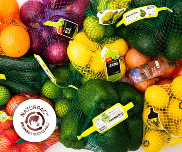 Naturpac Netpak Polyethylene Netting on limes lemons and oranges as part of Woolworths range.